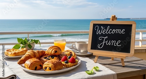 Welcome sign with fresh fruit and seafood spread on table.