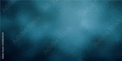 Fotografie Abstract blue textured background with light and shadow play and a soft focus effect suggesting depth and atmosphere