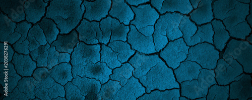 Photos Blue parched cracked earth soil pattern dry arid surface textured rugged background