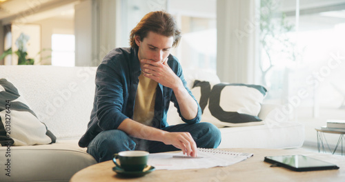 Fotografía Man, stress and reading paperwork in home for financial mistake, bankruptcy or mortgage debt