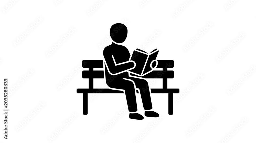 Fototapeta premium Person sitting on a park bench while reading a book represents a calm moment of quiet study and personal leisure time in an outdoor public space.