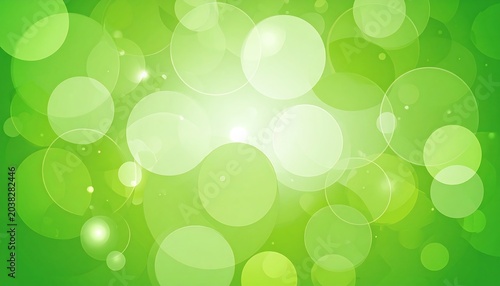 A vibrant, abstract background featuring various sized, glowing, translucent circles of green shades. Bright light is in center