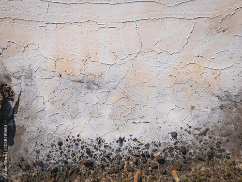 Bild auf Leinwand Aerial view of cracked earth and salt deposits