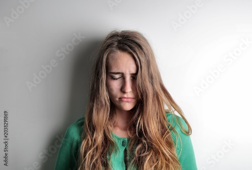 Canvas Print portrait of  a young sad woman