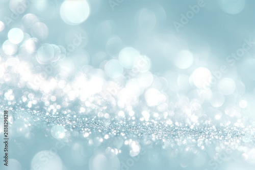 Sparkling blue bokeh background for fresh beauty design