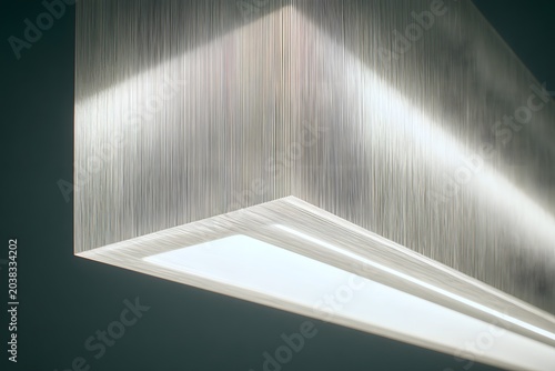 Modern brushed metal surface with soft LED light
