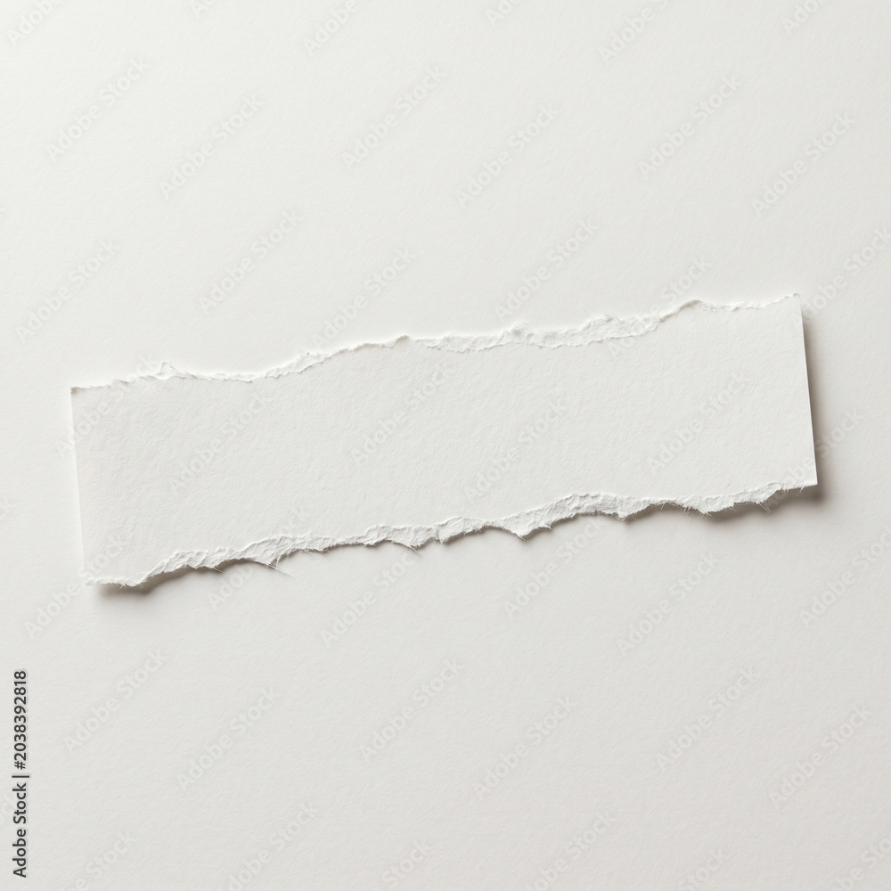 Fototapeta premium Minimalist blank white paper strip with distinctive rough, torn edges, providing an elegant, textured space for custom notes, announcements, or artistic typography in a clean setting