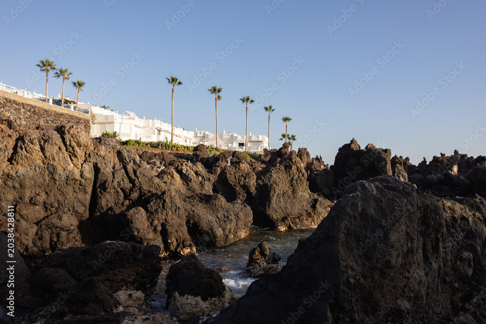 Fototapeta premium The rocky coastline at sunset