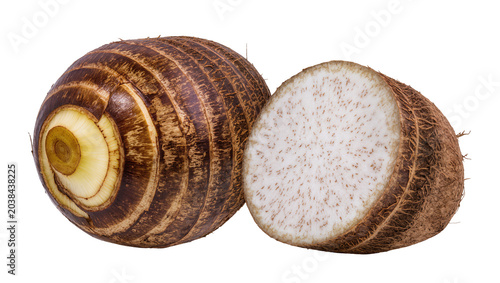 Quadro su tela Whole and halved taro root with fibrous brown skin and white speckled flesh