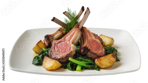 Rack of lamb with roasted potatoes and greens