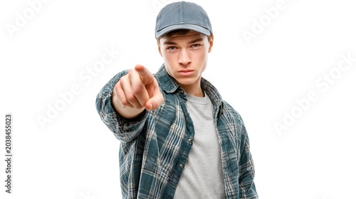A person pointing straight ahead at the viewer with a serious expression. Isolated on white background.