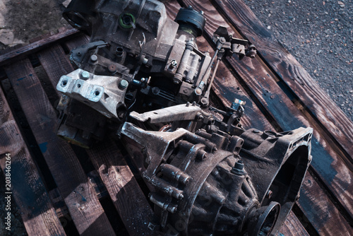 manual transmission from an old front-wheel drive car removed for cleaning and washing, repair and replacement of oil seals