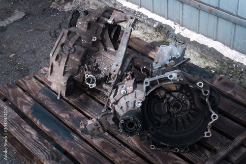 manual transmission from an old front-wheel drive car removed for cleaning and washing, repair and replacement of oil seals