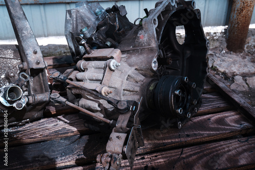 manual transmission from an old front-wheel drive car removed for cleaning and washing, repair and replacement of oil seals