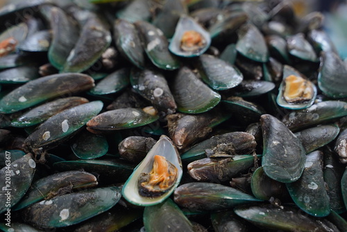 High angle view of raw and fresh Shrimp  displayed on ice tray in a traditional wet market in Thailand.