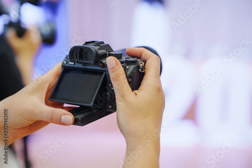 Adjusting Camera Screen Settings During School Assembly
