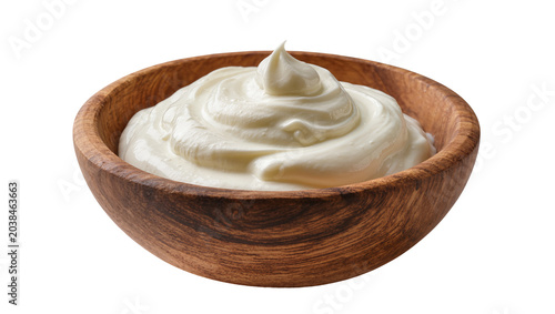 Cuadro en lienzo Creamy white sour cream swirl in wooden bowl