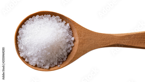 Photos Wooden spoon filled with coarse sea salt crystals