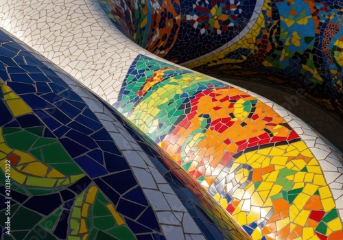 Captivating architectural details featuring organic curves and vibrant ceramic tile mosaic work in a distinctive modernist style, organic, pattern, architecture