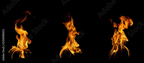 Tableau sur toile Collection of realistic fire flames isolated on black background, blazing fire set with dynamic burning shapes for overlay, heat effect, inferno, energy, cinematic composition, creative visual design