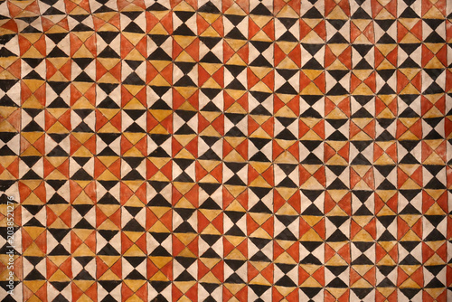 Hand drawn checkered pattern background with abstract dark squares. Seamless geometric art texture for design or backdrop.