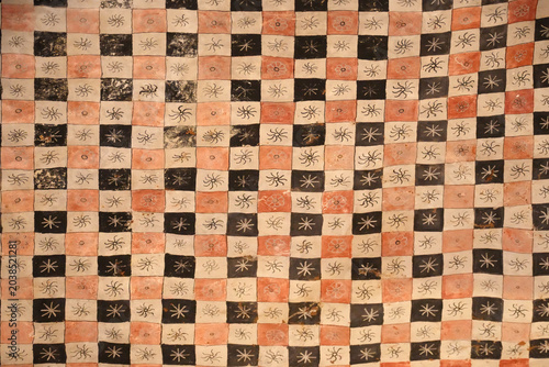 Hand drawn checkered pattern background with abstract dark squares. Seamless geometric art texture for design or backdrop.