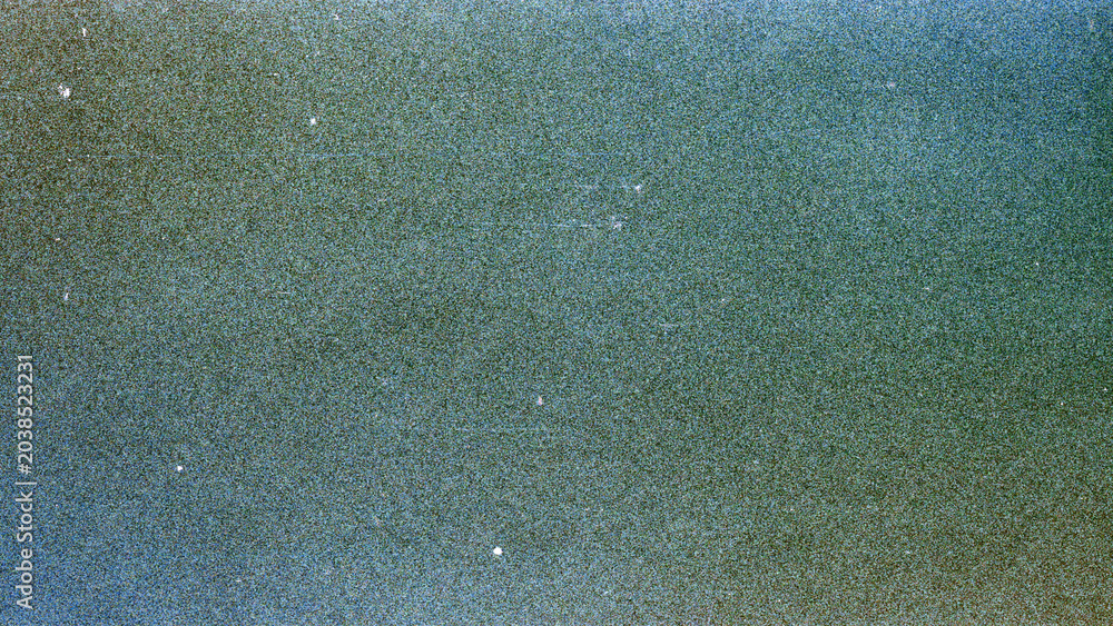 Obraz premium Blank grained film strip texture background with heavy grain, dust and light leak