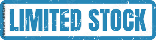 Foto Blue grunge rubber stamp text that reads limited stock for retail sales and mark