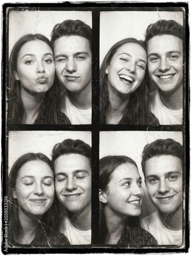 Young couple in their twenties making fun expressions in vintage black and white photo booth strip