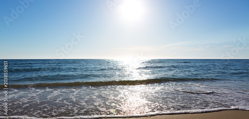 Sea Horizon with Sun Reflection on Sparkling Water.