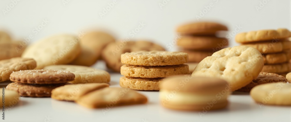 Obraz premium different biscuit types showcased on a white minimal backdrop