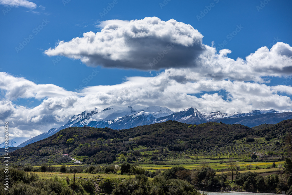 Obraz premium Clouds Over Mountain Village