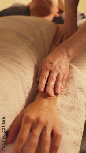 Professional Hand Massage Close Up Therapist Massaging Client Wrist And Forearm In Luxury Spa Salon