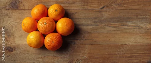 Panel kuchenny z motywem Group of citrus oranges positioned on an aged wooden backdrop