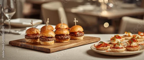 Obraz  z motywem Elegant event catering featuring mini meat burgers accompanied by shrimp canapes