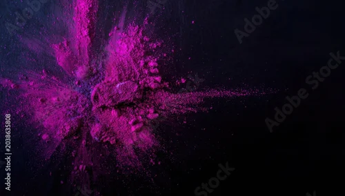 Fototapeta samoprzylepna Energetic color powder burst with cosmetic brush on dark canvas