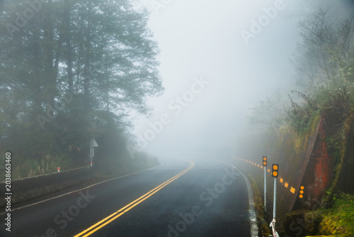 Konstfotografi Low Visibility Fog on Mountain Road