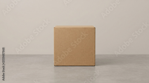 Front View Square Cardboard Box Mockup on Gray Surface