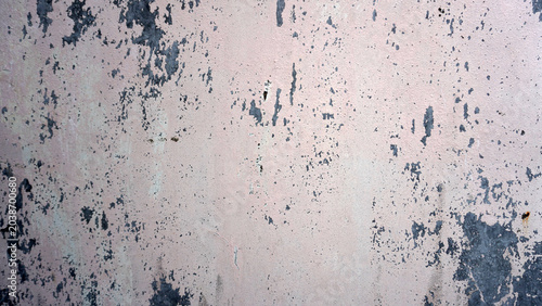 Photography Peeling paint wall texture with flaking layers, exposing grey beneath soft pink tones