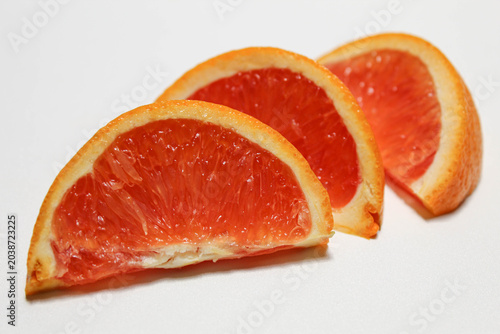 Cara cara navel orange, cuts of oranges, isolated on white background