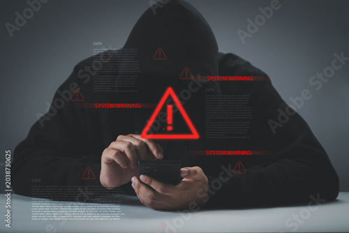 Fotografie hacker using smartphone with system warning alert overlay, cybercrime and mobile