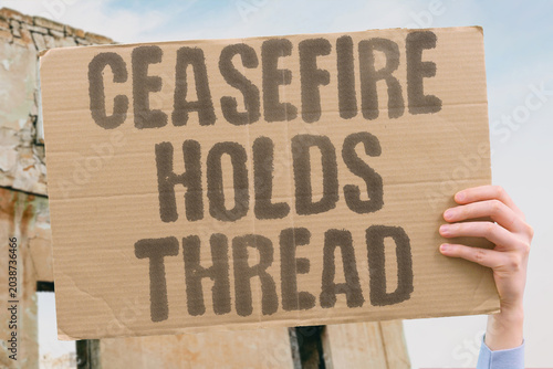 Quadro su tela "Ceasefire Holds Thread" Peace agreements barely survive reality