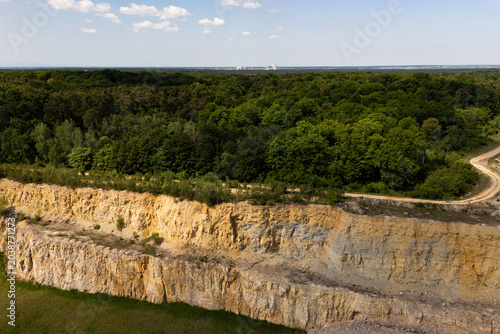 Fotografi Former open-pit mine restored to nature, ecological revitalization concept