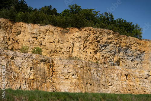 Fotografi Former open-pit mine restored to nature, ecological revitalization concept