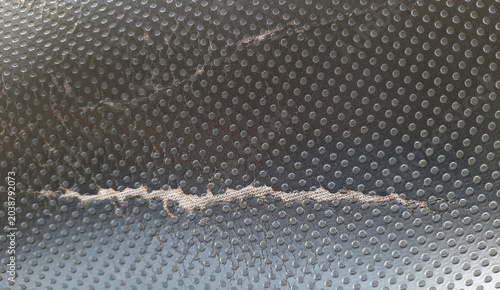 Tableau sur toile Black Synthetic Leather Texture with Worn Ripped Pattern and Cracked Surface Det