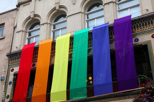 Photography LGBTQ rainbow flag over a store for the Pride Month (June) in Grafton Street, Dublin, Ireland