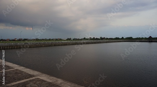 murky, flowing irrigation river water, landscape dam water 