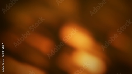 Abstract blurred warm-toned background with soft bokeh