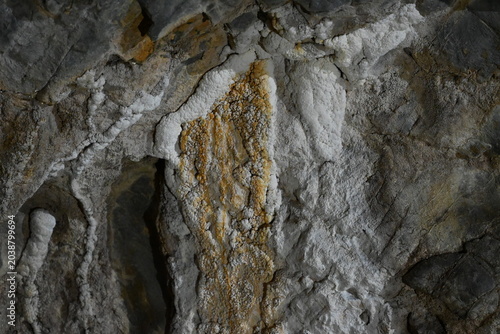 Tableau sur toile A striking view of white calcite veins and layered geological formations inside Kovacevica cave in Serbia