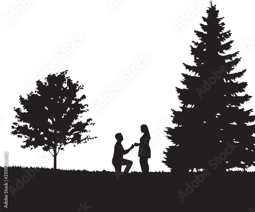 Fotografía Man proposing to woman in a forest